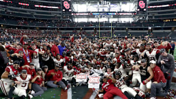 ARLINGTON, TEXAS - DECEMBER 01: The Oklahoma Sooners celebrate a 39-27 Big 12 Championship win against the Texas Longhorns at AT&T Stadium on December 01, 2018 in Arlington, Texas. (Photo by Ronald Martinez/Getty Images)