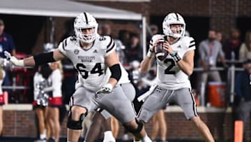 Nov 24, 2022; Oxford, Mississippi, USA; Mississippi State Bulldogs quarterback Will Rogers (2) looks to pass against the Ole Miss Rebels during the first quarter at Vaught-Hemingway Stadium. Mandatory Credit: Matt Bush-USA TODAY Sports