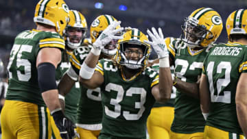 ARLINGTON, TX - OCTOBER 6: Aaron Jones #33 of the Green Bay Packers celebrates after scoring his fourth touchdown during a game against the Dallas Cowboys at AT&T Stadium on October 6, 2019 in Arlington, Texas. (Photo by Wesley Hitt/Getty Images)