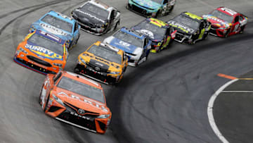 BRISTOL, TN - APRIL 15: Daniel Suarez, driver of the #19 ARRIS Toyota, leads a pack of cars during the Monster Energy NASCAR Cup Series Food City 500 at Bristol Motor Speedway on April 15, 2018 in Bristol, Tennessee. (Photo by Jerry Markland/Getty Images)