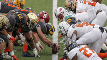 MOBILE, AL - JANUARY 30: A general view of the National Team at the line of scrimmage facing off against the American Team during the 2021 Resse's Senior Bowl at Hancock Whitney Stadium on the campus of the University of South Alabama on January 30, 2021 in Mobile, Alabama. The National Team defeated the American Team 27-24. (Photo by Don Juan Moore/Getty Images)