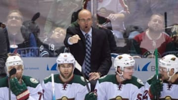 December 12, 2015; San Jose, CA, USA; Minnesota Wild head coach Mike Yeo instructs during the third period against the San Jose Sharks at SAP Center at San Jose. The Wild defeated the Sharks 2-0. Mandatory Credit: Kyle Terada-USA TODAY Sports