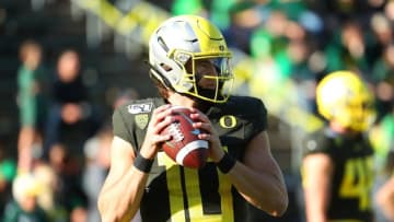 EUGENE, OREGON - OCTOBER 05: Justin Herbert #10 of the Oregon Ducks warms up prior to taking on the California Golden Bears during their game at Autzen Stadium on October 05, 2019 in Eugene, Oregon. (Photo by Abbie Parr/Getty Images)