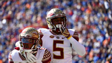 GAINESVILLE, FL - NOVEMBER 25: Nyqwan Murray #8 and Da'Vante Phillips #5 of the Florida State Seminoles react after an FSU touchdown during the first half of the game against the Florida Gators at Ben Hill Griffin Stadium on November 25, 2017 in Gainesville, Florida. (Photo by Rob Foldy/Getty Images)