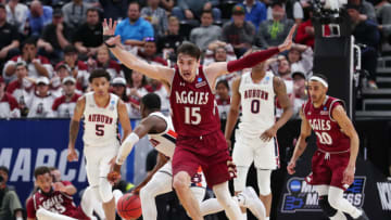 SALT LAKE CITY, UTAH - MARCH 21: Ivan Aurrecoechea #15 of the New Mexico State Aggies reacts during the second half against the Auburn Tigers in the first round of the 2019 NCAA Men's Basketball Tournament at Vivint Smart Home Arena on March 21, 2019 in Salt Lake City, Utah. (Photo by Tom Pennington/Getty Images)