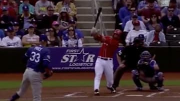 Los Angeles Dodgers pitcher David Price strikes out Cincinnati Reds slugger Joey Votto
