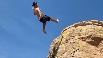 Former NFL quarterback Johnny Manziel cliff jumping.