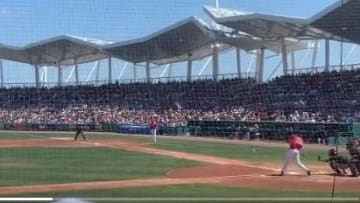 JD Martinez swinging on a pitch for the Red Sox