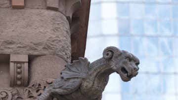 TORONTO, ONTARIO, CANADA - 2016/08/25: Old City Hall: Head of a stone gargoyle protruding from an intricate carved pink stone structure. (Photo by Roberto Machado Noa/LightRocket via Getty Images)