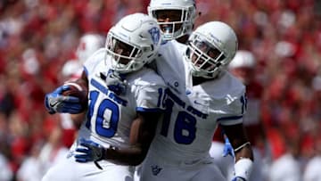 MADISON, WI - SEPTEMBER 17: Chandon Sullivan #10 and Penny Hart #18 of the Georgia State Panthers celebrate after Sullivan made an interception against the Wisconsin Badgers in the fourth quarter at Camp Randall Stadium on September 17, 2016 in Madison, Wisconsin. (Photo by Dylan Buell/Getty Images)