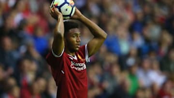 WIGAN, ENGLAND - JULY 14: Joe Gomez of Liverpool takes a throw in during the pre-season friendly match between Wigan Athletic and Liverpool at DW Stadium on July 14, 2017 in Wigan, England. (Photo by Alex Livesey/Getty Images)