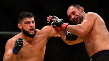 LAS VEGAS, NV - JULY 09: (L-R) Kelvin Gastelum punches Johny Hendricks in their welterweight bout during the UFC 200 event on July 9, 2016 at T-Mobile Arena in Las Vegas, Nevada. (Photo by Harry How/Zuffa LLC/Zuffa LLC via Getty Images)