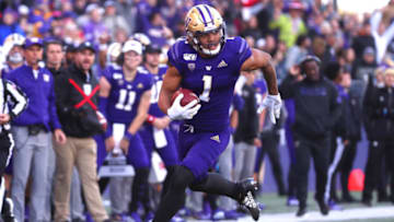 SEATTLE, WASHINGTON - NOVEMBER 02: Hunter Bryant #1 of the Washington Huskies runs for a 40 yard touchdown against the Utah Utes in the third quarter during their game at Husky Stadium on November 02, 2019 in Seattle, Washington. (Photo by Abbie Parr/Getty Images)