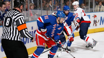 NEW YORK - APRIL 20: Markus Naslund #91 of the New York Rangers controls the puck against the Washington Capitals during Game Three of the Eastern Conference Quarterfinal Round of the 2009 Stanley Cup Playoffs on April 20, 2009 at Madison Square Garden in New York City. The Capitals defeat the Rangers 4-0. (Photo by Scott Levy/NHLI via Getty Images)