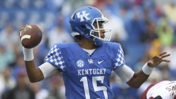 Sep 17, 2016; Lexington, KY, USA; Kentucky Wildcats quarterback Stephen Johnson (15) drops back to pass the ball against the New Mexico State Aggies in the first quarter at Commonwealth Stadium. Mandatory Credit: Mark Zerof-USA TODAY Sports