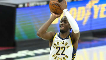 May 10, 2021; Cleveland, Ohio, USA; Indiana Pacers guard Caris LeVert (22) shoots in the fourth quarter against the Cleveland Cavaliers at Rocket Mortgage FieldHouse. Mandatory Credit: David Richard-USA TODAY Sports