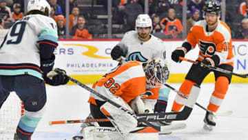 Feb 12, 2023; Philadelphia, Pennsylvania, USA; Philadelphia Flyers goaltender Felix Sandstrom (32) makes a save against the Seattle Kraken during the first period at Wells Fargo Center. Mandatory Credit: Eric Hartline-USA TODAY Sports