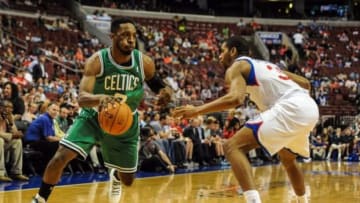 Apr 14, 2014; Philadelphia, PA, USA; Boston Celtics forward Jeff Green (8) drives toward the net as Philadelphia 76ers guard Hollis Thompson (31) defends during first quarter of the game at Wells Fargo Center. Mandatory Credit: John Geliebter-USA TODAY Sports