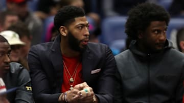 NEW ORLEANS, LOUISIANA - JANUARY 23: Anthony Davis #23 of the New Orleans Pelicans sits on the bench with an injury in his finger during the game against the Detroit Pistons at Smoothie King Center on January 23, 2019 in New Orleans, Louisiana. NOTE TO USER: User expressly acknowledges and agrees that, by downloading and or using this photograph, User is consenting to the terms and conditions of the Getty Images License Agreement. (Photo by Chris Graythen/Getty Images)