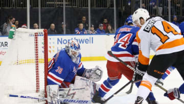 NEW YORK, NY - DECEMBER 23: Henrik Lundqvist #30 of the New York Rangers makes a save against the Philadelphia Flyers at Madison Square Garden on December 23, 2018 in New York City. (Photo by Jared Silber/NHLI via Getty Images)