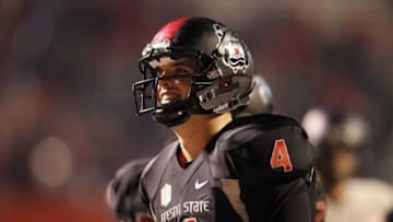 Dec 7, 2013; Fresno, CA, USA; Fresno State Bulldogs quarterback Derek Carr (4) looks towards the crowd after the Bulldogs defeated the Utah State Aggies 24-17 at Bulldog Stadium. Mandatory Credit: Cary Edmondson-USA TODAY Sports
