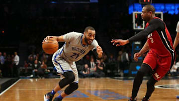 Jan 26, 2016; Brooklyn, NY, USA; Brooklyn Nets guard Wayne Ellington (21) drives past Miami Heat guard Dwyane Wade (3) during the third quarter at Barclays Center. Miami Heat won 102-98. Mandatory Credit: Anthony Gruppuso-USA TODAY Sports