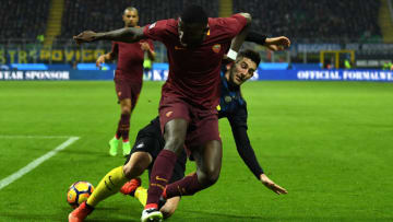 MILAN, ITALY - FEBRUARY 26: Roberto Gagliardini (R) of FC Internazionale is tackled by Antonio Rudiger of AS Roma during the Serie A match between FC Internazionale and AS Roma at Stadio Giuseppe Meazza on February 26, 2017 in Milan, Italy. (Photo by Valerio Pennicino/Getty Images )