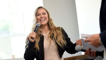 WEST HOLLYWOOD, CALIFORNIA - MARCH 22: Ronda Rousey speaks during Reebok Women's Luncheon, hosted by Ronda Rousey, on March 22, 2016 in Los Angeles, California. (Photo by Emma McIntyre/Getty Images for Reebok)