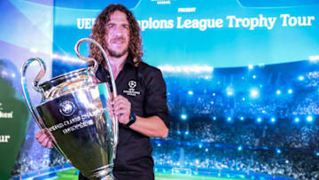 Carles Puyol holds the UEFA Cup trophy during UEFA Champions League Trophy Tour in Jakarta on March 11, 2019 in Jakarta, Indonesia. (Photo by Andrew Gal/NurPhoto via Getty Images)