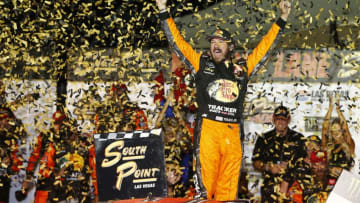 LAS VEGAS, NEVADA - SEPTEMBER 15: Martin Truex Jr., driver of the #19 Bass Pro Shops Toyota, celebrates in victory lane after winning the Monster Energy NASCAR Cup Series South Point 400 at Las Vegas Motor Speedway on September 15, 2019 in Las Vegas, Nevada. (Photo by Jonathan Ferrey/Getty Images)