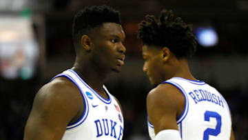 COLUMBIA, SOUTH CAROLINA - MARCH 24: Zion Williamson #1 of the Duke Blue Devils talks with Cam Reddish #2 against the UCF Knights during the first half in the second round game of the 2019 NCAA Men's Basketball Tournament at Colonial Life Arena on March 24, 2019 in Columbia, South Carolina. (Photo by Kevin C. Cox/Getty Images)