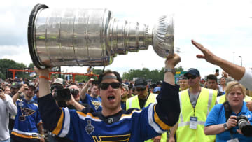 ST. LOUIS, MO - JUN 15: St. Louis Blues leftwing Jaden Schwartz (17) lifts the Stanley Cup during the St. Louis Blues victory parade held on June 15, 2019, in downtown, St. Louis, Mo. (Photo by Keith Gillett/Icon Sportswire via Getty Images)