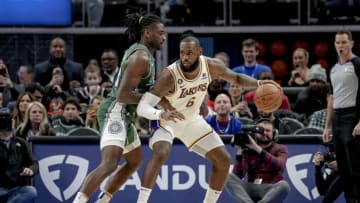 LeBron James #6 of the Los Angeles Lakers handles the ball against Isaiah Stewart #28 of the Detroit Pistons (Photo by Nic Antaya/Getty Images)