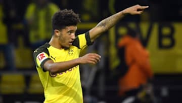 26 September 2018, North Rhine-Westphalia, Dortmund: Soccer: Bundesliga, Borussia Dortmund - 1st FC Nuremberg, 5th matchday at Signal Iduna Park. Jadon Sancho of Dortmund cheers the 6:0 against Nuremberg. Photo: Ina Fassbender/dpa - WICHTIGER HINWEIS: Gemäß den Vorgaben der DFL Deutsche Fußball Liga bzw. des DFB Deutscher Fußball-Bund ist es untersagt, in dem Stadion und/oder vom Spiel angefertigte Fotoaufnahmen in Form von Sequenzbildern und/oder videoähnlichen Fotostrecken zu verwerten bzw. verwerten zu lassen. (Photo by Ina Fassbender/picture alliance via Getty Images)