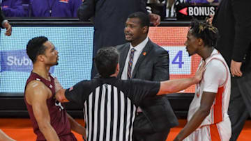 South Carolina guard Jair Bolden(52), left, and Clemson guard Tevin Mack(13).