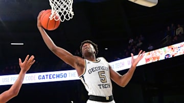 ATLANTA, GA - JANUARY 9: Moses Wright #5 of the Georgia Tech Yellow Jackets grabs a rebound against the Virginia Tech Hokies at McCamish Pivilion on January 9, 2019 in Atlanta, Georgia. (Photo by Scott Cunningham/Getty Images)