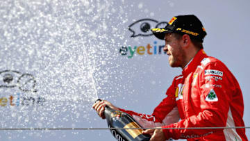SPIELBERG, AUSTRIA - JULY 01: Third place finisher Sebastian Vettel of Germany and Ferrari (Photo by Mark Thompson/Getty Images)