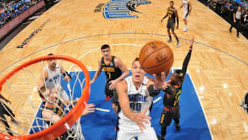 ORLANDO, FL - DECEMBER 6: Aaron Gordon #00 of the Orlando Magic shoots the ball against the Atlanta Hawks on December 6, 2017 at Amway Center in Orlando, Florida. NOTE TO USER: User expressly acknowledges and agrees that, by downloading and or using this photograph, User is consenting to the terms and conditions of the Getty Images License Agreement. Mandatory Copyright Notice: Copyright 2017 NBAE (Photo by Fernando Medina/NBAE via Getty Images)
