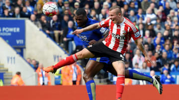 LEICESTER, ENGLAND - APRIL 03: Wes Morgan of Leicester City outjumps Jordy Clasie of Southampton to score their first goal during the Barclays Premier League match between Leicester City and Southampton at The King Power Stadium on April 3, 2016 in Leicester, England. (Photo by Michael Regan/Getty Images)