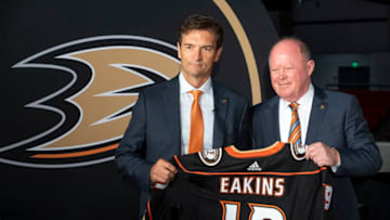 IRVINE, CA - JUNE 17: The new Anaheim Ducks Head Coach Dallas Eakins, left, was presented with a Ducks jersey by General Manager Bob Murray during a press conference at Great Park Ice in Irvine, CA on Monday, June 17, 2019. Eakins is the Ducks 10th head coach. He was most recently head coach at the San Diego Gulls of the American Hockey League (AHL). (Photo by Paul Bersebach/MediaNews Group/Orange County Register via Getty Images)