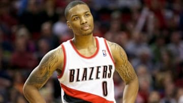 April 17, 2013; Portland, OR, USA; Portland Trail Blazers point guard Damian Lillard (0) pauses during a free throw against Golden State Warriors in the second half at the Rose Garden. Mandatory Credit: Jaime Valdez-USA TODAY Sports