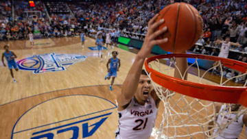 Mar 9, 2023; Greensboro, NC, USA; Virginia Cavaliers forward Kadin Shedrick (21) scores in the second half of the quarterfinals of the ACC tournament at Greensboro Coliseum. Mandatory Credit: Bob Donnan-USA TODAY Sports