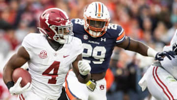 Auburn footballAlabama Crimson Tide running back Brian Robinson Jr. (4) runs the ball during the Iron Bowl at Jordan-Hare Stadium in Auburn, Ala., on Saturday, Nov. 27, 2021. Auburn Tigers leads Alabama Crimson Tide 7-0 at halftime.