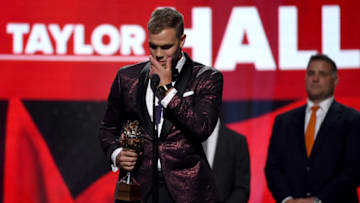 LAS VEGAS, NV - JUNE 20: Taylor Hall of the New Jersey Devils accepts the Hart Trophy given to the most valuable player to his team onstage at the 2018 NHL Awards presented by Hulu at The Joint inside the Hard Rock Hotel & Casino on June 20, 2018 in Las Vegas, Nevada. (Photo by Ethan Miller/Getty Images)