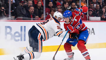 MONTREAL, QC - DECEMBER 09: Edmonton Oilers right wing Jesse Puljujarvi (98) tries to hold Montreal Canadiens right wing Brendan Gallagher (11) during the first period of the NHL game between the Edmonton Oilers and the Montreal Canadiens on December 9, 2017, at the Bell Centre in Montreal, QC. (Photo by Vincent Ethier/Icon Sportswire via Getty Images)