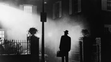 A silhouette of a man stands in front of a house at night in a still from the film,' The Exorcist', directed by William Friedkin, 1973. (Photo by Warner Bros./Courtesy of Getty Images)