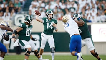;Manny BunchEAST LANSING, MI - AUGUST 30: Brian Lewerke #14 of the Michigan State Spartans throws a pass in the first quarter against the Tulsa Golden Hurricane at Spartan Stadium on August 30, 2019 in East Lansing, Michigan. (Photo by Joe Robbins/Getty Images)