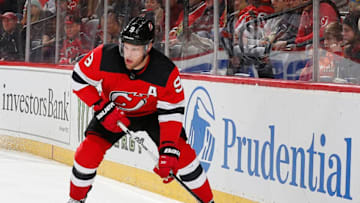 NEWARK, NJ - DECEMBER 6: Taylor Hall #9 of the New Jersey Devils plays the puck against the Chicago Blackhawks during the game at the Prudential Center on December 6, 2019 in Newark, New Jersey. (Photo by Andy Marlin/NHLI via Getty Images)"n"n"n