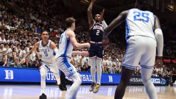 Nov 10, 2023; Durham, North Carolina, USA; Arizona Wildcats guard Caleb Love (2) shoots over Duke Blue Devils center Kyle Filipowski(30) during the first half at Cameron Indoor Stadium. Mandatory Credit: Rob Kinnan-USA TODAY Sports