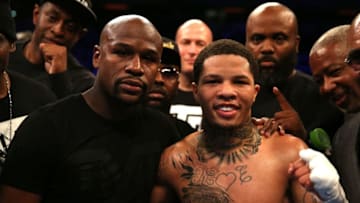 LONDON, ENGLAND - MAY 20: Gervonta Davis of The United States celebrates with Floyd Mayweather following victory against Liam Walsh of England in the IBF World Junior Lightweight Championship match at Copper Box Arena on May 20, 2017 in London, England. (Photo by Alex Pantling/Getty Images)